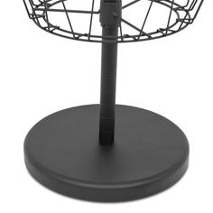 a black wire basket on top of a metal stand with an umbrella holder attached to it