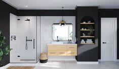 a bathroom with black walls and white tiles on the floor is decorated in natural wood