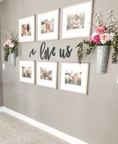 the wall is decorated with pictures and flowers