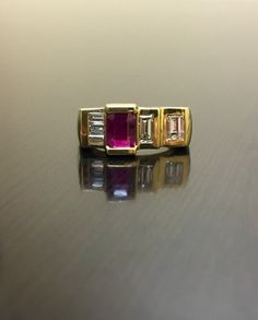 18K Yellow Gold Art Deco Diamond Ruby Engagement Ring - 18K Gold Art Deco Emerald Cut Ruby Diamond Wedding Ring - Diamond Art Deco Ruby Ring by DeKaraDesigns on Etsy https://www.etsy.com/listing/398451483/18k-yellow-gold-art-deco-diamond-ruby Designer Yellow Gold Wedding Rings, Designer 14k Gold Wedding Rings, Gold Multi-stone Diamond Ring In Art Deco Style, Yellow Gold Baguette Cut Ruby Wedding Ring, Emerald Cut Multi-stone Ruby Ring For Wedding, Baguette Cut Ruby Ring In Yellow Gold For Wedding, Gold Baguette Cut Ruby Diamond Ring, Gold Ruby Baguette Cut Diamond Ring, Yellow Gold Multi-stone Ruby Ring For Wedding