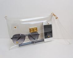 It is very nice design .Each bag is hand cut and carefully to make it by Hand. 100 % handmade .It is very nice clutch, purse for your party and every day. It is a see through bag .Easy to find everything in your bag. **You can select the color and material Nickel or gold color of accessory** -Material: Made by Clear Vinyl in High Quality and Very good accessory. -Country of Origin: Made in Thailand -Size Approx. W 15 x L 24 x D 2.5 cm. ( Medium Size) (W6xL9 1/2 xD1) -The Length of the s... Transparent Purse, Transparent Clutch, Clear Stadium Bag, Clear Clutch, Clear Purses, Transparent Bag, Best Pens, Pencil Bags, Clear Bags