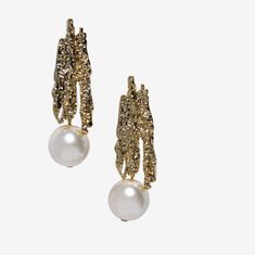 With full on glamour, these faux pearl earrings feature sculptural 'tree bark' textured gold studs.  Super chic, these earrings perfectly offset a sharp masculine outfit, and give a modern edge to glamorous evening looks.  Earrings measure 4 cm in length. Gold plated ear stud is nickle free and hypo allergenic. We've tested these by wearing daily for a week with no damage to the finish and no adverse skin reaction. We advice removing when showering, swimming, applying hairsprays etc. All my item Party Pearl Charm Earrings, Party Pearl Earrings With Metal Charm, Gold Pear-shaped High Luster Pearl Earrings, Luxury Gold-plated Plug Earrings, Festive Gold-plated Chandelier Earrings With Pearl Drop, Modern Pearl Earrings, Luxury Gold Shell-shaped Earrings, Gold Pearl Shell-shaped Earrings, Perfect Bridal Shower Gift