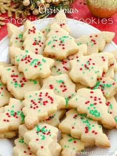 christmas shortbread cookies with sprinkles on a plate