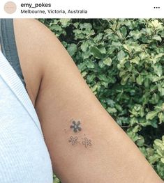 a person with a small tattoo on their arm