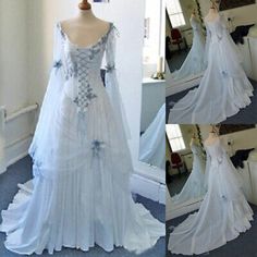 the dress is white and has blue flowers on it