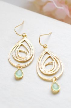 Gold Swirl Drop Pendant Mint Glass Drop Earrings Wire Wrapped Gold Plated Drop Earrings, Gold Teardrop Earrings For Bridesmaid Gift, Gold Dangle Teardrop Earrings For Bridesmaid Gift, Elegant Drop-shaped Glass Jewelry, Elegant Yellow Gold Swirl Earrings, Yellow Gold Nickel-free Dangle Teardrop Earrings, Brass Filigree Drop Earrings, Jewelry Advice, Glass Drop Earrings