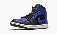 The Air Jordan 1 Mid “Hyper Royal” appears in a similar color block to an original and iconic colorway of Michael Jordan’s first signature shoe.  The royal and black color combination of the “Hyper Royal” is reminiscent of the look of the Air Jordan 1 High “Royal,” one of the most popular Jordan models of all-time.  Blue leather detailing can be found on the perforated toe and on the upper eyelets, collar, heel, and Swoosh branding.  Black tumbled leather is located on the forefoot, mid-panel, a Royal Shoes, Air Jordan 1 Mid Black, Black Color Combination, Jordan Model, Jumpman Logo, Jordan 11 Retro Low, Air Jordan 5 Retro, Jordan 11 Retro, Kids Jordans