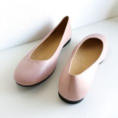 "❣ PRODUCT DESCRIPTION Blush pink Bridal Leather Ballet Flats leather custom-made and rounded toe made in Greece. These ballerina pumps are made of very soft cow leather, have leather insole with foam inside for comfort in walking, dancing, and with very soft sole non-slip. Elegant and delicate light pink ballets for wedding ceremonies.  The sole is lightweight and handmade with high-durability rubber. If you are not sure about your size or need a different one, please send us a mail through the \"Ask a question\" and we will assist you. ❣ INFORMATION * Leather Cow Upper * Leather lining * Leather insole * Slightly padded footbed * Outsoles: Durable Anti-slippery Rubber * Heel Height: 0.39\" / 1 cm * Sizes available: 5,5 to 11.5 US Women's / 36 to 42 Europe 🤍Enjoy browsing my shop: www.et Elegant Pink Flats With Rubber Sole, Pink Leather Ballet Flats For Formal Occasions, Formal Pink Leather Ballet Flats, Elegant Pink Flats With Leather Sole, Pink Leather Ballet Flats With Leather Sole, Elegant Pink Ballet Flats Closed Toe, Elegant Pink Closed Toe Ballet Flats, Pink Almond Toe Ballet Flats, Pink Ballet Flats With Leather Sole