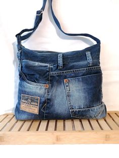 an old pair of jeans has been used as a purse