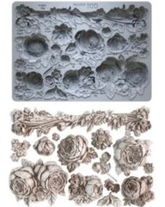 a cookie sheet with roses and leaves on it, next to an image of the mold