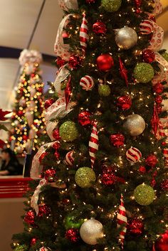 a decorated christmas tree with candy canes and ornaments