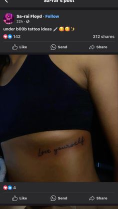 a woman's stomach with the word love yourself tattooed on it