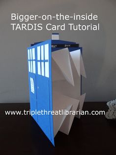 a cardboard tardis card box sitting on top of a table