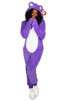 a woman in a purple animal costume