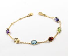 Multi Gemstone Bezel Bracelet,Mulit Color Bracelet,Handmade Bracelet,Statement Bracelet,Solid 925 Sterling Silver Jewelry,Birthday Gift SKU -ETB1029 Style - Bracelet (An30) Gemstone - Blue Topaz , Citrine,Amethyst,Iolite ,Garnet,Peridot Metal - 92.5 % Solid Sterling Silver Weight- 2.6g Approx Length:-7 Inch Stone Shape-Oval Stone Cut - Faceted Stone Size-7x5mm Elegant Multicolor Bracelets For Birthday, Bezel Bracelet, Silver Handmade Jewelry, Color Bracelet, Adjustable Jewelry, Sterling Silver Jewelry Handmade, Birthday Jewelry Gift, Statement Bracelet, Oval Stone