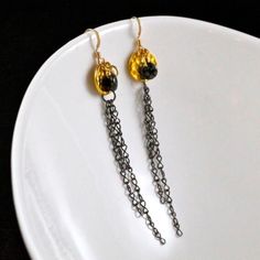 "Earring Ingredients:  Jet/Bronze/Picasso Lentil, Gold Hammered Round Link, Gunmetal plated figure eight chain.   Earrings are approximately 3.25\" from end to end and have 14kt gold filled ear wires." Black Gold-plated Drop Earrings, Patina Brass Dangle Earrings, Vintage Brass Dangle Clip-on Earrings, Handmade 14k Gold-filled Dangle Chandelier Earrings, Gold 14k Gold-filled Dangle Chandelier Earrings, Shades Of Violet, Light Earrings, Swarovski Crystal Earrings, Swarovski Earrings