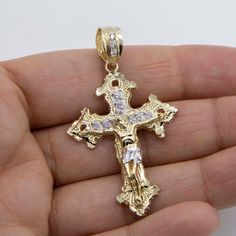 "2\" CZ Jesus Crucifix Cross Pendant Real 10K Yellow White Gold * Metal : Real 10K Yellow White Gold (Properly Stamped, 10K)  * Condition : Brand New  * Finish : Polished  * Average Weight : 4.37 grams  * Length : 2\" = 54mm  * Width : 1 1/4\" = 31mm  * Clasp/Bail : 7.5mm All of our items are brand new and are shipped with a gift box." Collectible Gold Crucifix Jewelry, Yellow Gold Crucifix Cross Necklace, Gold Pendants For Men, Yellow Gold Hallmarked Cross Pendant, Natural Gold Nugget, Gold-plated Yellow Gold Crucifix Necklace, Yellow Gold Crucifix Cross Necklace, Gold Plated, Expensive Jewelry Luxury, Natural Gold