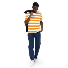 Elevate your style with our Orange and White Striped Shirt for Men. Crafted from a premium blend of 95% polyester and 5% elastane, this shirt ensures a comfortable fit that doesn't compromise on durability. The smooth fabric feels delightful against your skin and retains its vibrant color over time, making it a lasting addition to your wardrobe. With its four-way stretch capabilities, this shirt offers exceptional flexibility and comfort, whether you're on the move or enjoying a relaxed day out. Casual Cotton T-shirt With Contrast Stripes, Contrast Stripes Crew Neck T-shirt For Streetwear, Contrast Stripes T-shirt For Summer Streetwear, White Relaxed Fit T-shirt With Contrast Stripes, Casual T-shirt With Contrast Stripes, Relaxed Fit, Casual Orange Cotton T-shirt, Orange Striped Shirt Outfit, Orange And White Striped Shirt, Striped Shirt Outfit Men