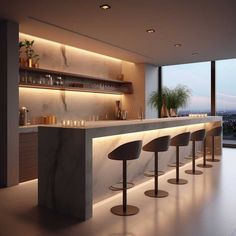 a modern bar with stools in front of a large window overlooking the city at night