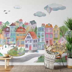 a living room with a large mural on the wall