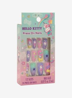 Drift off into Dreamland with the cutest nails! This faux nail set features pastel designs of Hello Kitty dressed as a unicorn with stars and desserts  plus rhinestone accents. Comes with 24 nails and a tube of glue. Fake Nails Hello Kitty, Hello Kitty Press On Nails, Hello Kitty Press Ons, Sanrio Fake Nails, Hello Kitty Glue On Nails, Fake Nails For Kids, Pink Neon Wallpaper, Lilo And Stitch Merchandise, Hello Kitty Dress