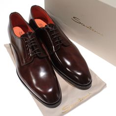 Santoni Brown Elegant Brown Derby Shoes With Almond Toe, Elegant Brown Derby With Almond Toe, Elegant Brown Almond Toe Derby Shoes, Elegant Brown Almond Toe Derby, Luxury Italian Leather Shoes For Formal Occasions, Luxury Brown Derby Shoes For Semi-formal, Luxury Almond Toe Dress Shoes For Semi-formal Occasions, Luxury Semi-formal Dress Shoes With Almond Toe, Elegant Goodyear Welted Calf Leather Shoes