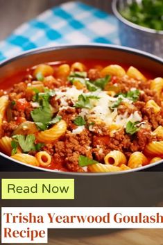 a close up of a bowl of pasta with meat