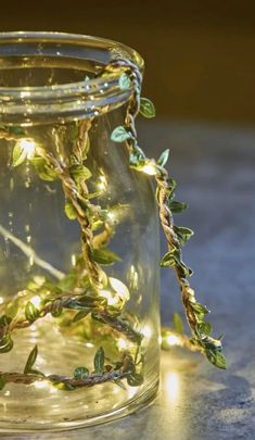 a glass jar with some lights in it