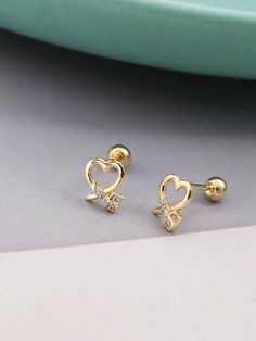 custom order 5-6 weeks  Come with jewelry bag  style 1. 4.6 x 5mm. post 8mm x 0.8mm  style 2  5x 6.1mm. post 8mm x 0.8mm each order is for one single earring.  Any jewelry for pierced ears can not be returned, for hygiene reasons Material: 10k solid gold  Gold Info:  24K gold is 100% pure 18K contains 75% gold and 25% alloyed metals 14K is 58% gold and 42% alloyed metals 10K 41.7%gold  ----------------------------------------------------------------------  quality, simplicity, reasonable price For questions or inquiry please do not hesitate to contact us. We will be happy to assist you.  SHIPPING: 1. Shipping takes approximately 3-5 business days (exclude weekend and holiday) for domestic customer.  Shipping via USPS five days a week Monday to Friday and comes with insurance.  You can trac Gold Heart-shaped Elegant Piercings, Elegant Gold Heart-shaped Piercings, Elegant Gold Heart Piercings, Gift Wrap Box, Mini Studs, Jewelry Bag, Single Earring, Pierced Ears, Stud Earring