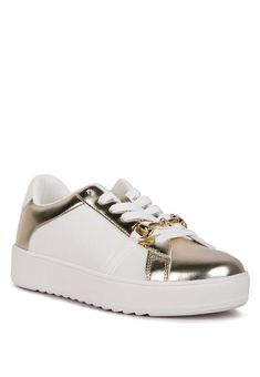 The faux leather sneakers are all about that metallic magic with the elevation of the horsebit embellishment. The chunky sneakers are all about making a statement and we're here for it! Outer material: Metallic Faux LeatherOuter sole: RubberClosed Rounded ToeContrasting Metallic ExteriorHorsebit EmbellishmentLace Up DetailChunky PlatformsLightly Cushioned InsolesSH4289Made In: ChinaMaterial Composition: Metallic Faux Leather Metallic Sneakers, Loafer Mules, Stylish Clothes For Women, Chunky Platform, Chunky Sneakers, Shoes With Jeans, Champagne Gold, Leather Sneakers, Bag Sale