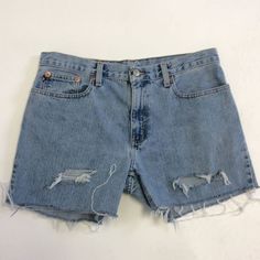 These weathered, vintage jeans have been cut to short  length, and distressed.  Vintage Ralph Lauren RL brand. The waist measures 33 inches around and the hips measure 41 inches around.  The inseam is 4 inches long.  The thighs measure 24 inches around.   Find more handmade clothing & accessories at:  dinwiddies.etsy.com Find  unique items for the home at:  dinwiddieshome.etsy.com www.dinwiddies.blogspot.com Vintage Washed Cutoff Jean Shorts, Vintage Light Wash Straight Leg Jean Shorts, Vintage Washed Cutoff Bottoms, Vintage Denim Blue Jean Shorts With Frayed Hem, Vintage Light Wash Cutoff Bottoms, Vintage Washed Faded Jean Shorts, Vintage Faded Washed Jean Shorts, Faded Vintage Washed Jean Shorts, 90s Distressed Mid-rise Bottoms