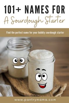 two jars filled with whipped cream on top of a wooden table