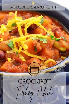 crockpot turkey chili recipe in a blue bowl with text overlay that reads,