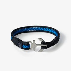 Ahoy, sailor! Brace yourself with our Oceanic Anchor Nautical Rope Bracelet - the perfect accessory for any sea lover. This handmade bracelet features two bold navy blue stripes and a vibrant blue stripe in the middle, reminiscent of the vast ocean. The addition of a silver-tone anchor charm adds a touch of nautical charm and completes the look. It is made to order, so it ensures a comfortable fit for all wrist sizes, making it the ideal accessory for any seafaring adventure. Get ready to set sail in style with the Oceanic Anchor Nautical Rope Bracelet. How to choose the right size for the bracelet: Please measure your wrist and select the EXACT measurement of the wrist. For example, if the wrist measures 18 cm, please select 18 cm the size of the bracelet. If you want to make the bracelet Blue Bracelets With Stainless Steel Clasp As A Gift, Nautical Blue Bracelets For Gifts, Nautical Blue Bracelets As A Gift, Blue Nautical Bracelets As Gifts, Blue Nautical Bracelets For Gift, Blue Nautical Style Bracelet For Gift, Navy Nautical Bracelets As Gift, Casual Navy Bracelet As A Gift, Casual Navy Bracelets For Gifts