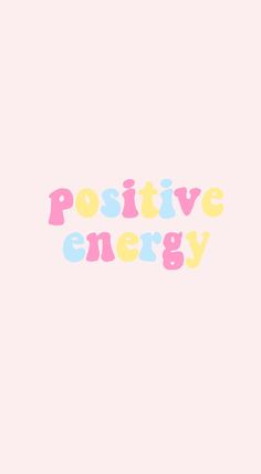 the words positive energy are painted in pink, yellow and blue on a white background