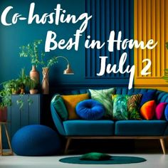 a blue couch sitting next to a green plant in a living room with the words co - hosting best in home july 2