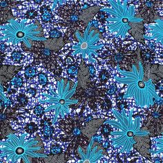 a blue and black flower pattern on fabric