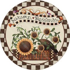 a plate with sunflowers on it and the words autumn written in cursive writing