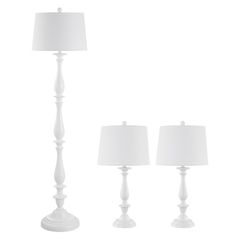 three white lamps are next to each other on a white background with one lamp turned off