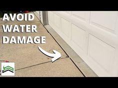 a white garage door with the words avoid water damage written on it and an arrow pointing up