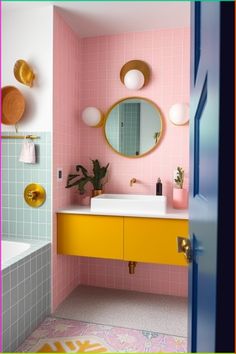 a bathroom with pink tiles and yellow cabinets