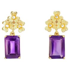 Amethyst 14k gold earrings studs. Amethyst flower earrings. Clower amethyst earrings. Thee-Leaf Clover Studs Earings in 14k gold. Lucky Clover Stud Earrings. Amethyst danity earrings. February birthstone earrings. Metal: 14k gold weight: 5.2 gr Earrings size: 25x12mm Set with amethyst, color - violet. Emerald cut, apx 6 ct. in total. Clarity: Transparent with iclusions. Side stones: 0.06 ct diamonds, G/H, Si clarity, round brilliant cut. Amethyst Flower, Color Violet, Birthstone Earrings, Amethyst Color, Earrings Metal, Lucky Clover, Earrings Studs, February Birthstone, Birthstone Earring