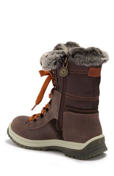 A leather pair of lace-front mid boots features a wool blend lining for staying warm, along with ProDri Technology and a water resistant design. 8.5" shaft height; 11" opening circumference Side zip closure Faux fur lining Round toe with bumper Leather upper/textile faux fur lining/synthetic sole Imported Mid Boots, Winter Boots Women, Winter Boot, Stay Warm, Side Zip, Lace Front, Wool Blend, Womens Boots, Faux Fur