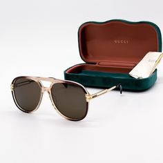 NEW GUCCI GG1104S 002 AVIATOR BROWN UNISEX SUNGLASSES GUCCI 100% NEW AUTHENTIC EYEWEAR WITH FULL PACKAGE Brand: Gucci Model: Gucci GG1104S 002 Condition: New with full package Frame color: Brown Lens color: Brown Frame material: Acetate Lens socket: 61 mm Bringe width: 16 mm Temple length: 145 mm Made in Italy Item included: authentic eyewear, certificate of authentic, cleaning cloth, case, bag. Gucci Gold Aviator Sunglasses, Gucci Aviator Sunglasses In Gold, Gucci Casual Aviator Sunglasses With Uva Protection, Casual Gucci Aviator Sunglasses With Uva Protection, Luxury Aviator Sunglasses With Gradient Lenses For Outdoor, Gucci Brown Anti-reflective Sunglasses, Gucci Anti-reflective Brown Sunglasses, Gucci Designer Aviator Sunglasses With Tinted Lenses, Gucci Brown Tinted Aviator Sunglasses