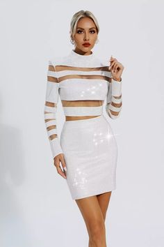 White Long Sleeve Crop Top For Party, Chic Long Sleeve Crop Top For Party, Elegant Long Sleeve Sequined Crop Top, Elegant Crop Top For Club And Party Season, Glamorous Long Sleeve Crop Top For Club, Glamorous Fitted Long Sleeve Crop Top, Chic Long Sleeve Sequined Crop Top, Chic Bodycon Crop Top For Party, Elegant Long Sleeve Crop Top For Night Out