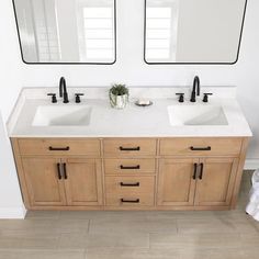 two sinks are shown with mirrors above them in a white and wood bathroom area that also has tile flooring