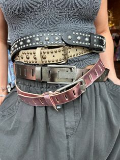 A classic accessory infused with heritage style, this leather belt from We The Free features rounded stud details for an eye-catching addition to any outfit. Features: Medium width, leather fabrication, rounded stud embellishments, adjustable buckle closure Why We <3 It: Perfect for cinching your waist and adding shape to any piece. Stacked Belts Outfit, Stacked Belts, Stud Outfits, Stud Belt, Girls Together, Jewelry Candles, Shopping Event, Studded Belt, Heritage Fashion