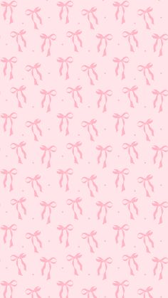 pink bows on a light pink background for wallpaper or wrapping paper that looks like fabric