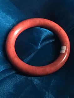 61mm Intense! Pink Red Round Princess Cut XiuYu Nephrite Jade Bangle Bracelet 61.33mmx12.23 x 11.76mm This is a substantial and solid piece of xiu yu Nephrite jade bangle! Comes with gemologist certificate of authenticity. Note: we do not offer refunds, so feel free to ask questions prior to purchase! Photos taken indoors so there is a slight yellowish hue not present in reality. Spiritual Carved Round Bracelets, Spiritual Round Carved Bracelets, Luxury Red Bangle, Jade Bangle Bracelet, Bangle Box, Mother Wedding, Star Magic, Jade Bangle, Nephrite Jade