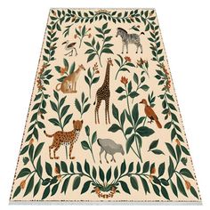 a rug with animals and plants on it